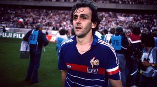 27 June 1984 European Football Championship Final - France v Spain - Captain Michel Platini walks off the pitch, leaving the other French players to continue the victory celebrations. (Photo by Mark Leech/Getty Images)
