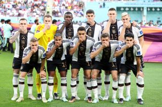 Germany players protest ahead of their 2022 World Cup match against Japan