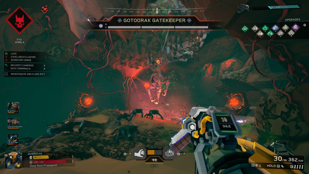 Deep Rock Galactic Rogue Core: A player looking at the Gotodrak Gatekeeper boss inside a cave, surrounded by creatures.