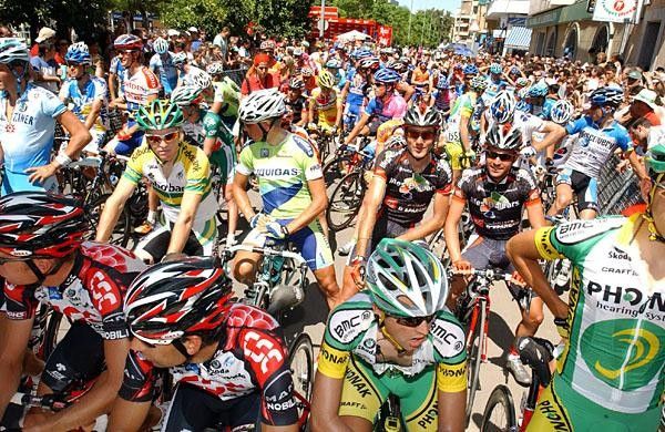 The peloton chatters nervously before what they knew would be a hot day on the bike