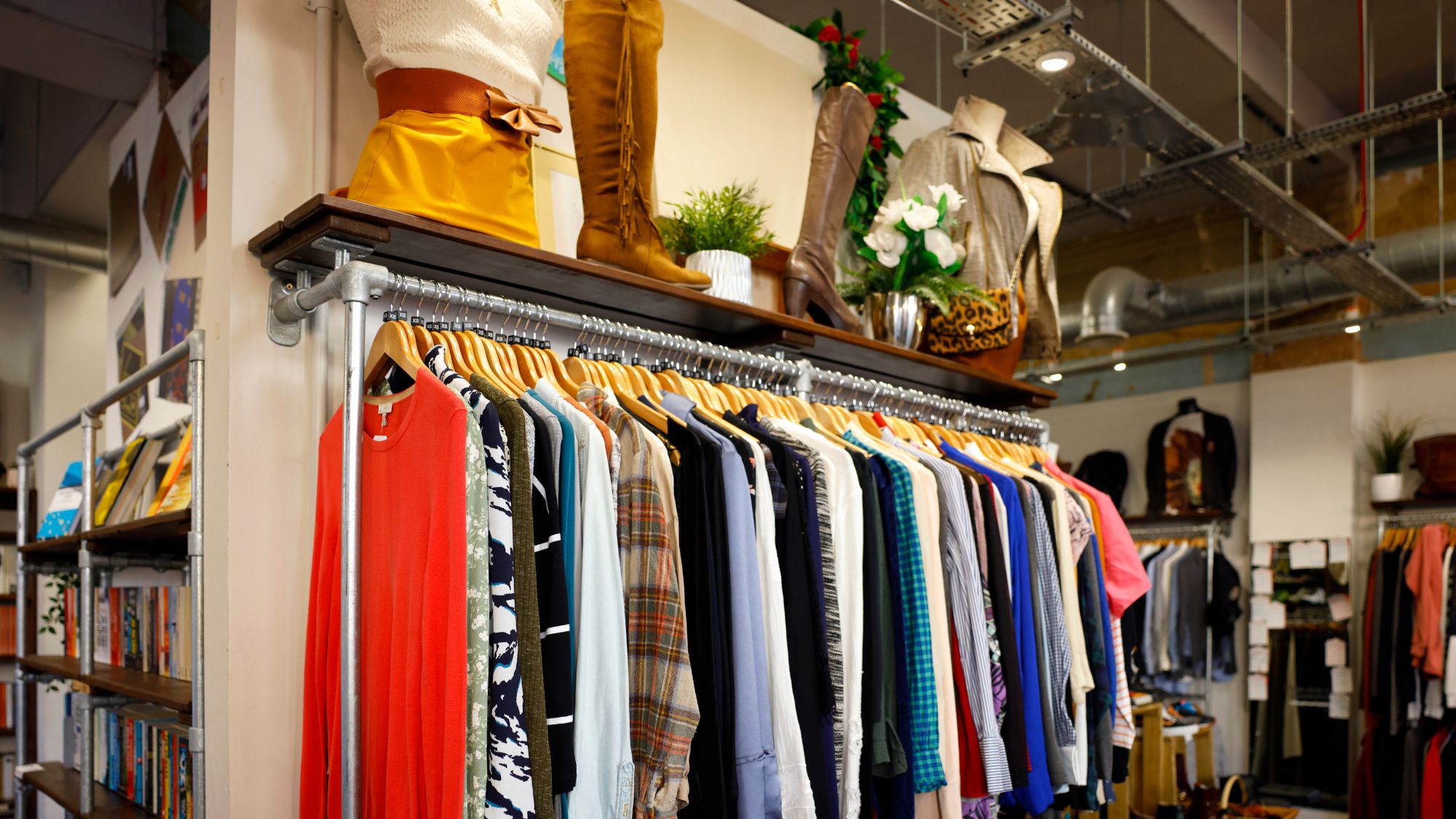 Best charity shops: A rail of secondhand clothes in a charity shop