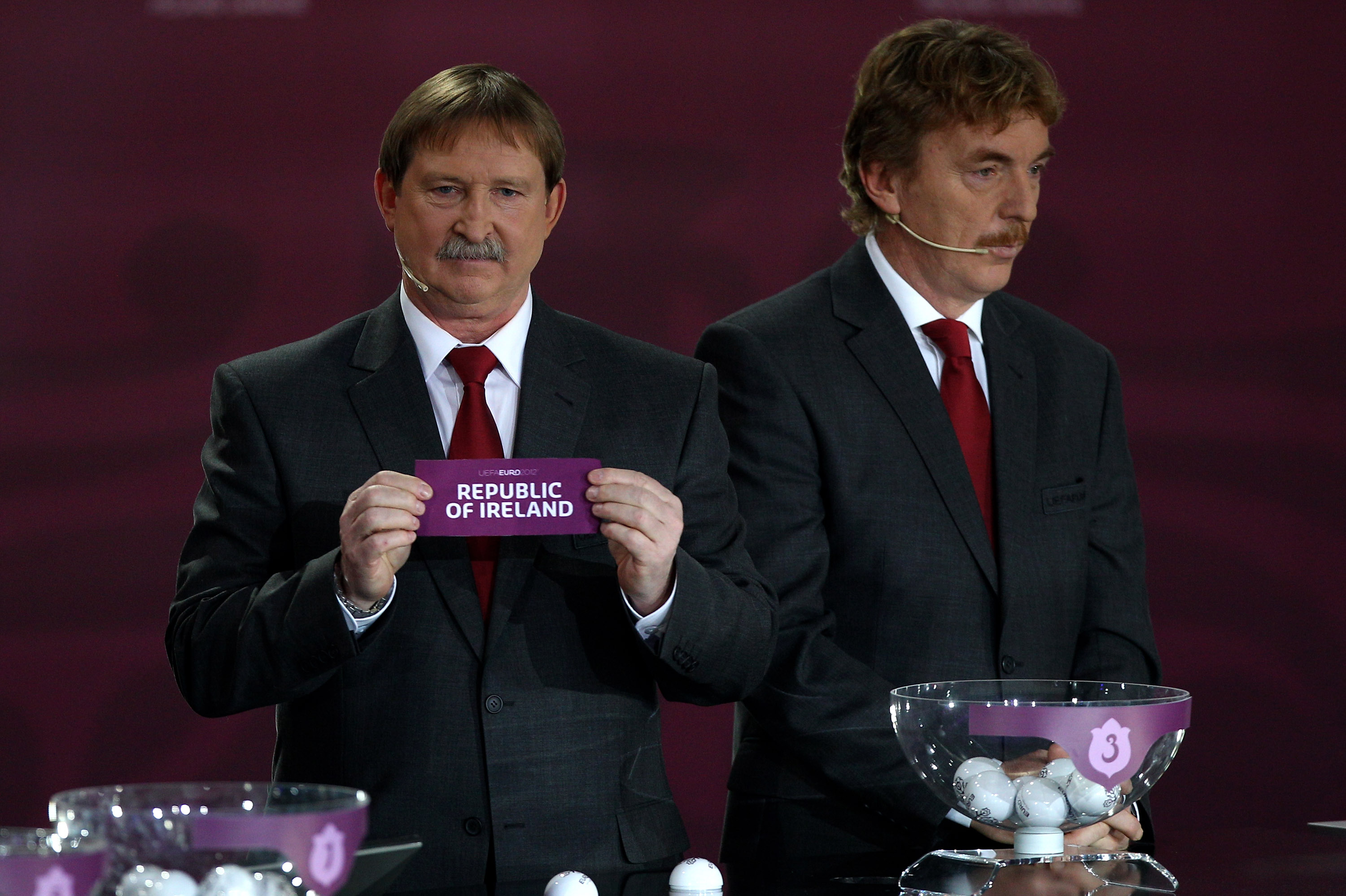 Andrzej Szarmach (L) draws Republic of Ireland into Group B alongside Zbigniew Boniek during the Euro2012 Qualifying Draw at the Palace of Culture and Science on February 7, 2010 in Warsaw, Poland.