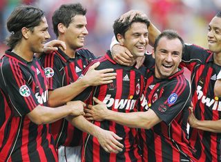 Milan, ITALY: AC Milan's captain defender Alessandro Costacurta (C) celebrates with teammates after scoring a goal against Udinese, during his last macth of Italian serie A football match at Udine's Friuli stadium, 19 May 2007. AFP PHOTO/ANDREAS SOLARO (Photo credit should read ANDREAS SOLARO/AFP via Getty Images)