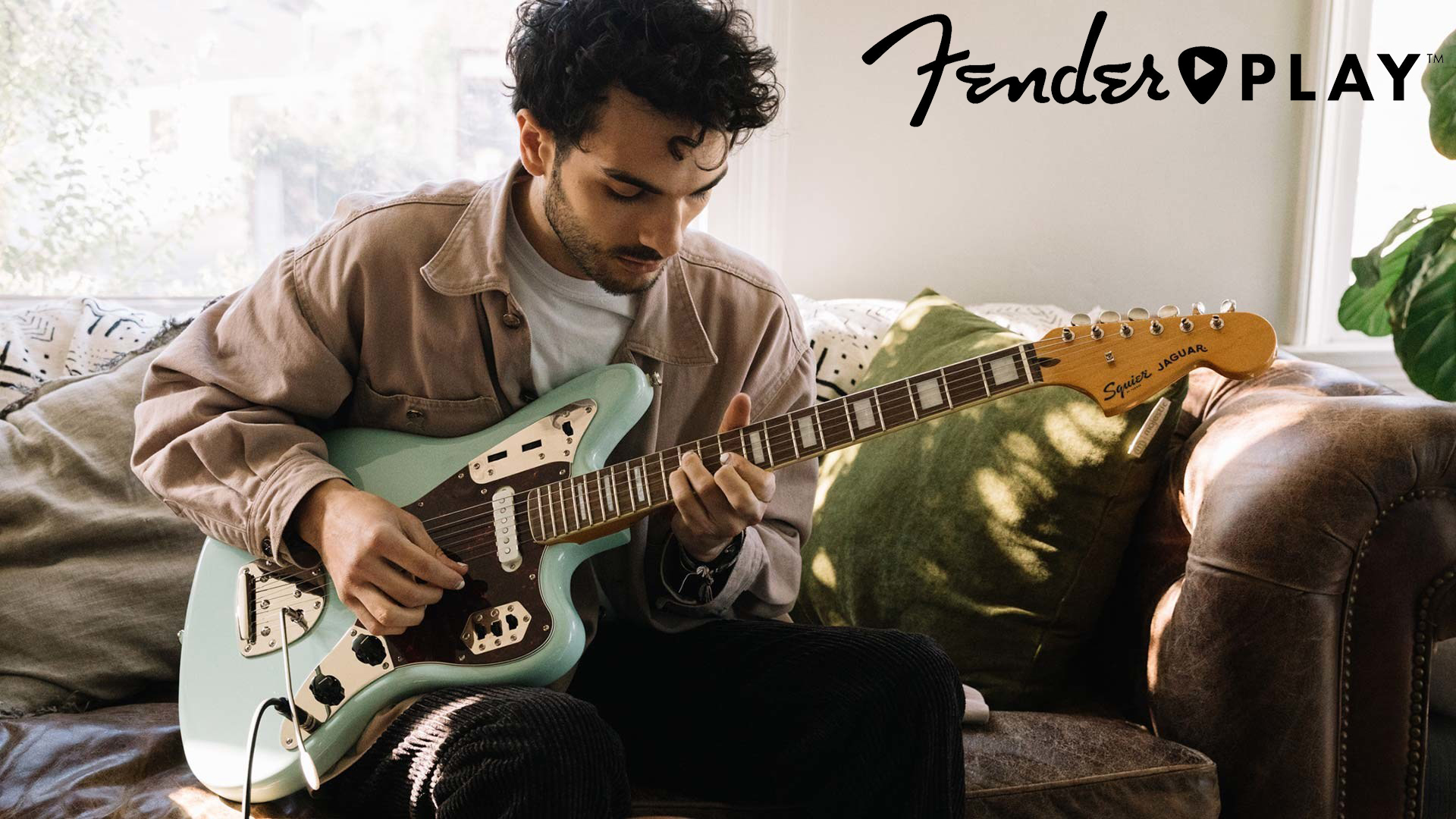 Fender Play review: man plays an electric guitar