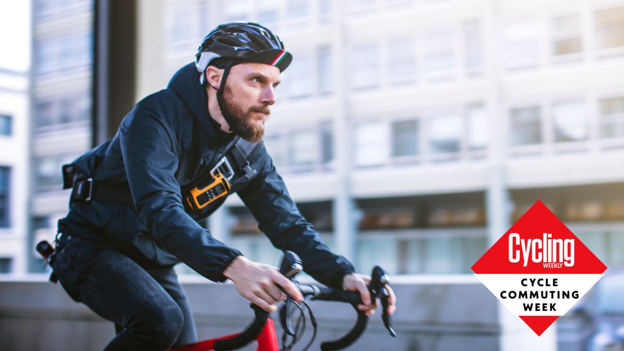 Male cyclist riding to work