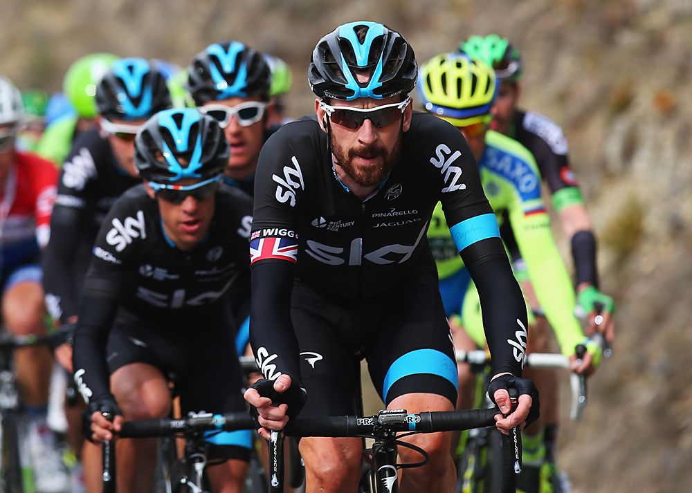 Bradley Wiggins works for Sky team leader Richie Porte