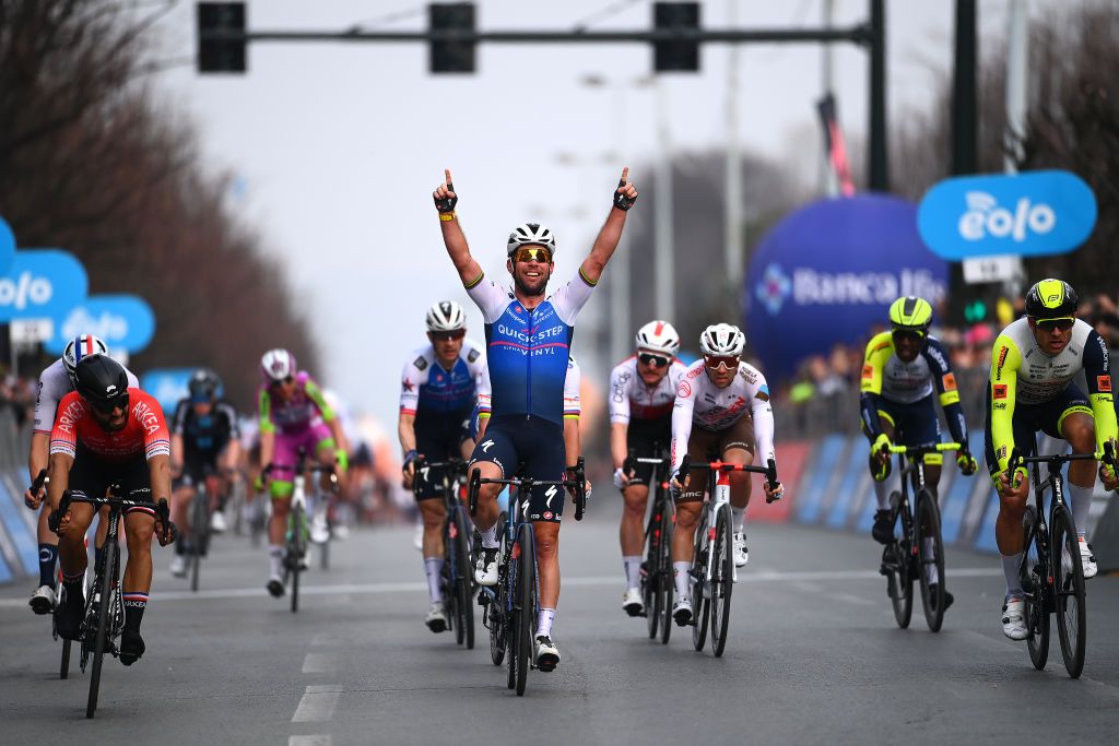 MILAN ITALY MARCH 16 Mark Cavendish of United Kingdom and Team QuickStep Alpha Vinyl celebrates at finish line as race winner ahead of Nacer Bouhanni of France and Team Arka Samsic L and Alexander Kristoff of Norway and Team Intermarch Wanty Gobert Matriaux R during the 103rd MilanoTorino 2022 a 197km one day race from Magenta to Rivoli MilanoTorino on March 16 2022 in Milan Italy Photo by Tim de WaeleGetty Images