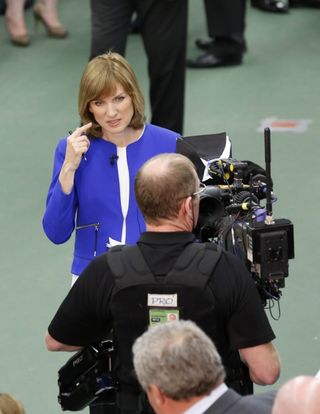 Fiona Bruce at work as a reporter