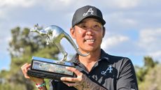 Anthony Kim poses with the LIV Golf Adelaide trophy