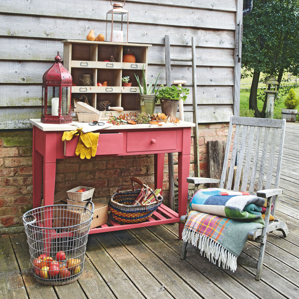 garden area with pink table and chair