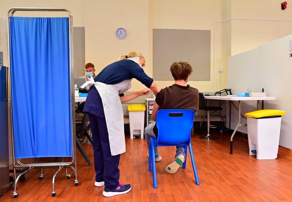 Vaccine being administered.