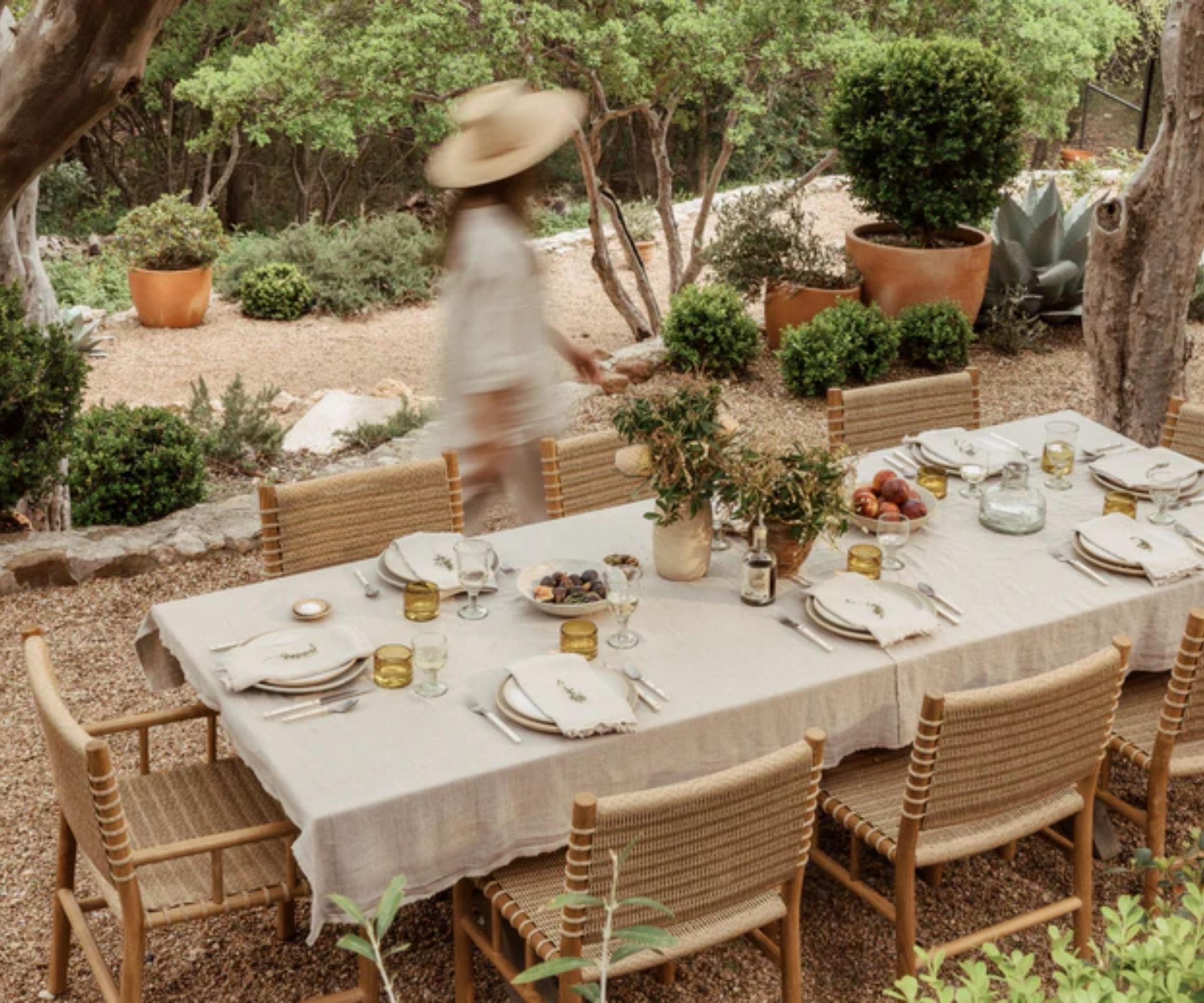 hati home outdoor furniture lifestyle image with a boho dining table set up