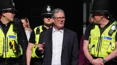 Keir Starmer talks to a group of police officers