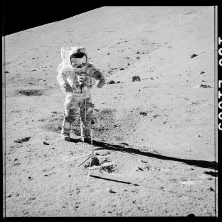 Apollo 17 moonwalker Gene Cernan preparing to collect samples 73001 and 73002 at Station 3 on Dec. 12, 1972.