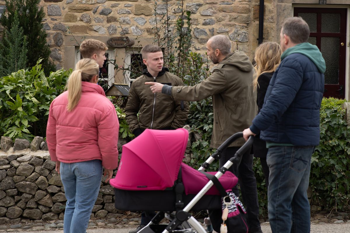 Sam argues with Samson Dingle in the street 