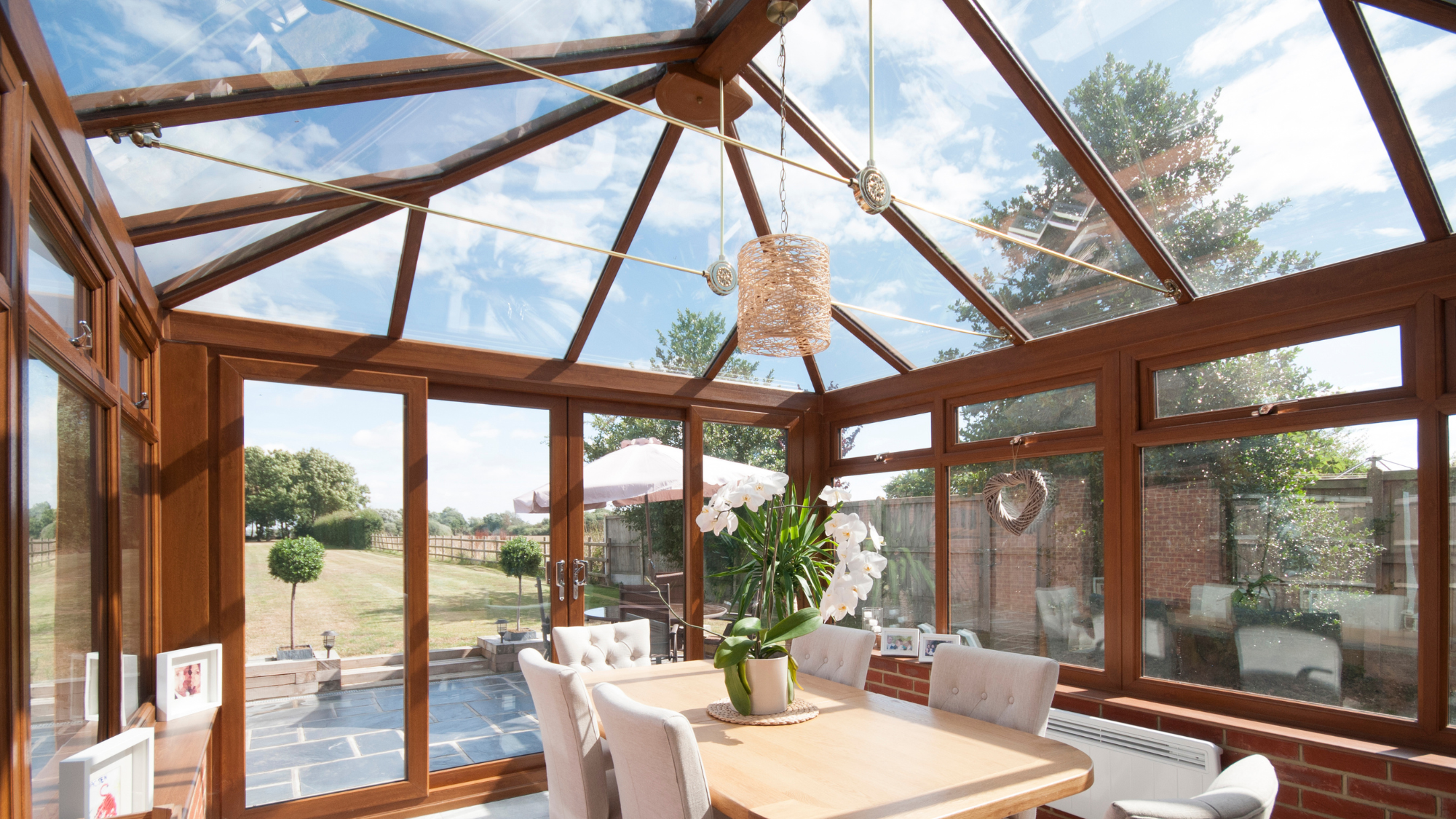 conservatory with brown wooden panes