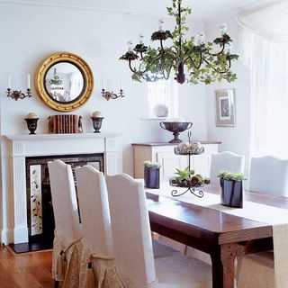 dining room with table and chair and mirror