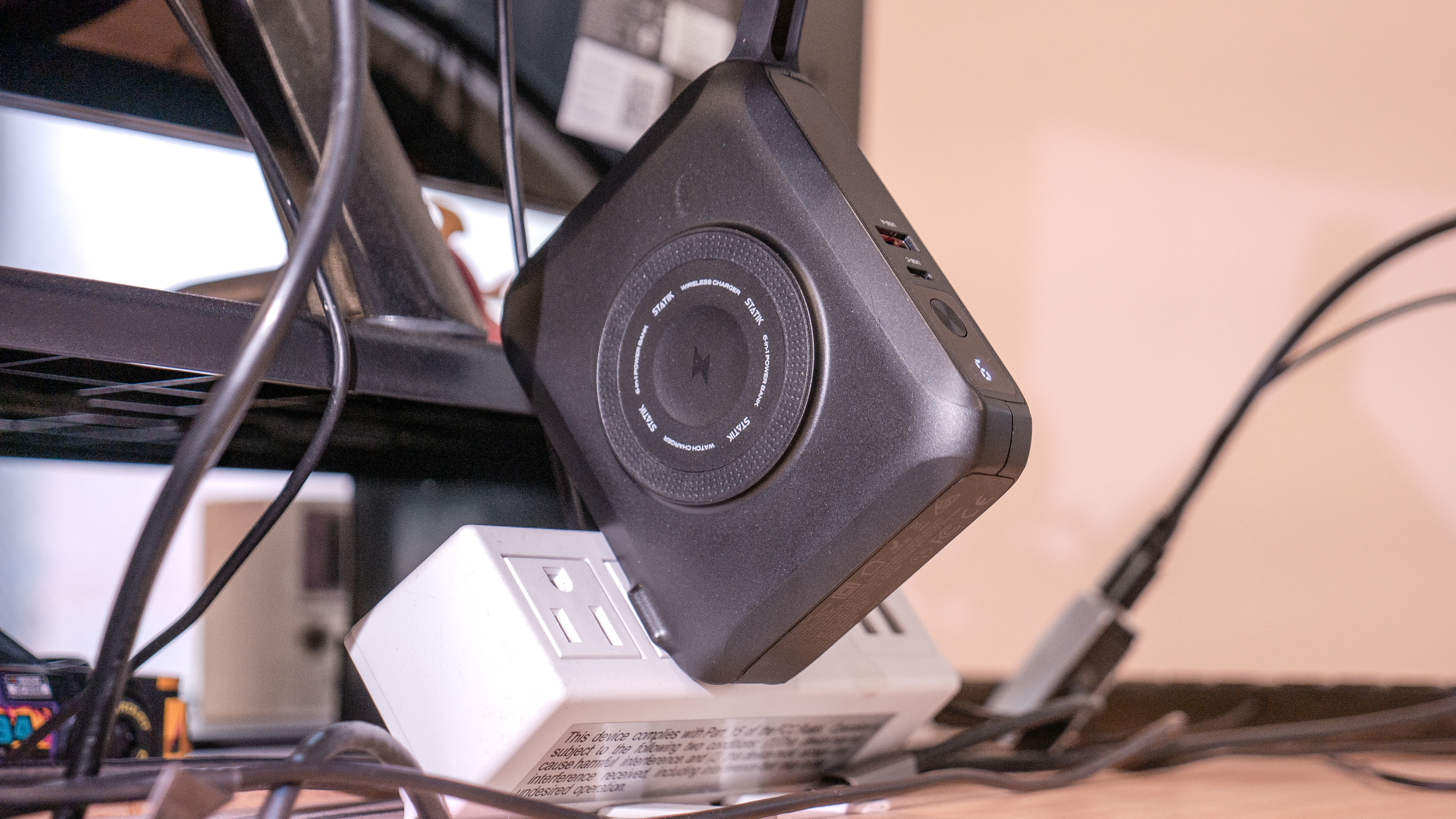 Statik SmartCharge Pro charging in a outlet.