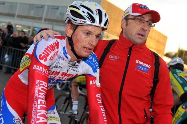 Winner Kevin Pauwels is led away by his soigneur Verzorger Kine