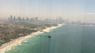 View of Dubai coast and downtown from high room