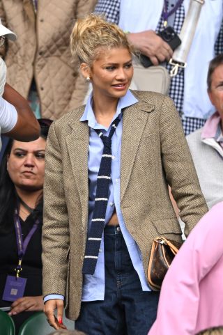 Zendaya at Wimbledon 2024 wearing a maroon summer manicure