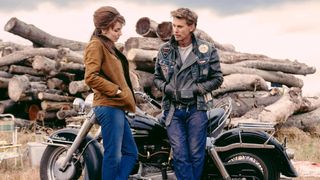 (L-R) Jodie Comer as Kathy and Austin Butler as Benny in "The Bikeriders"