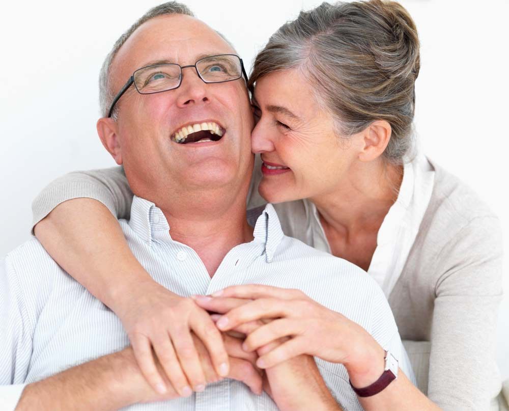 elderly couple laughing