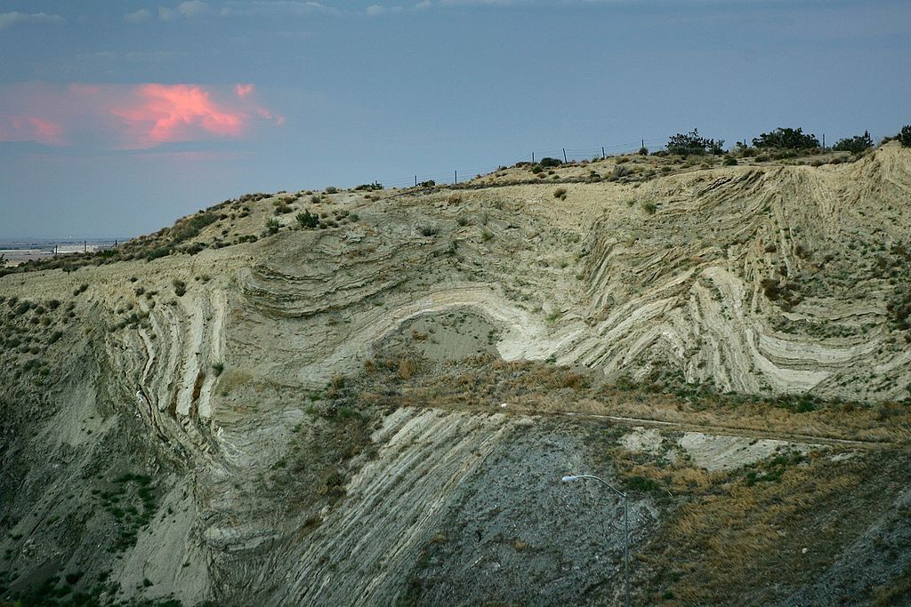 Layers of earthquake-twisted earth stand out where the freeway crosses the San Andreas Fault on June 28, 2006.