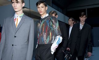 Male models wearing suits and patterned shirts from the Dior SS2015 collection