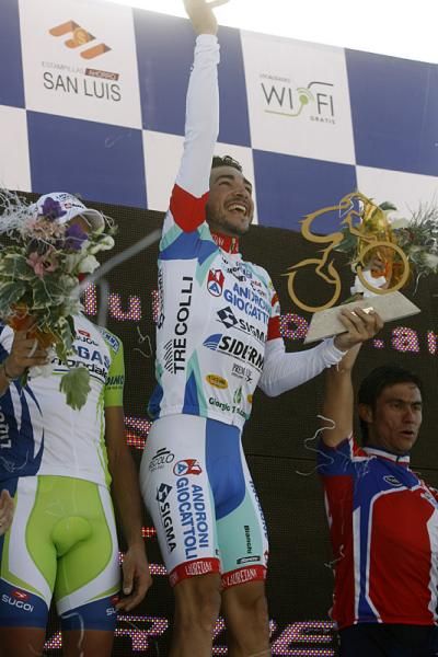 Jose Serpa celebrates his stage two victory on the podium.