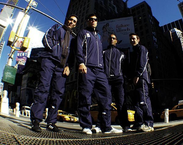 Team members pose in Times Square