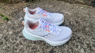 Saucony Hurricane 24 running shoe on a path outdoors