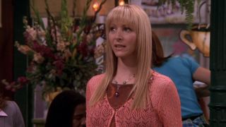 Phoebe looking thoughtful while speaking in Friends