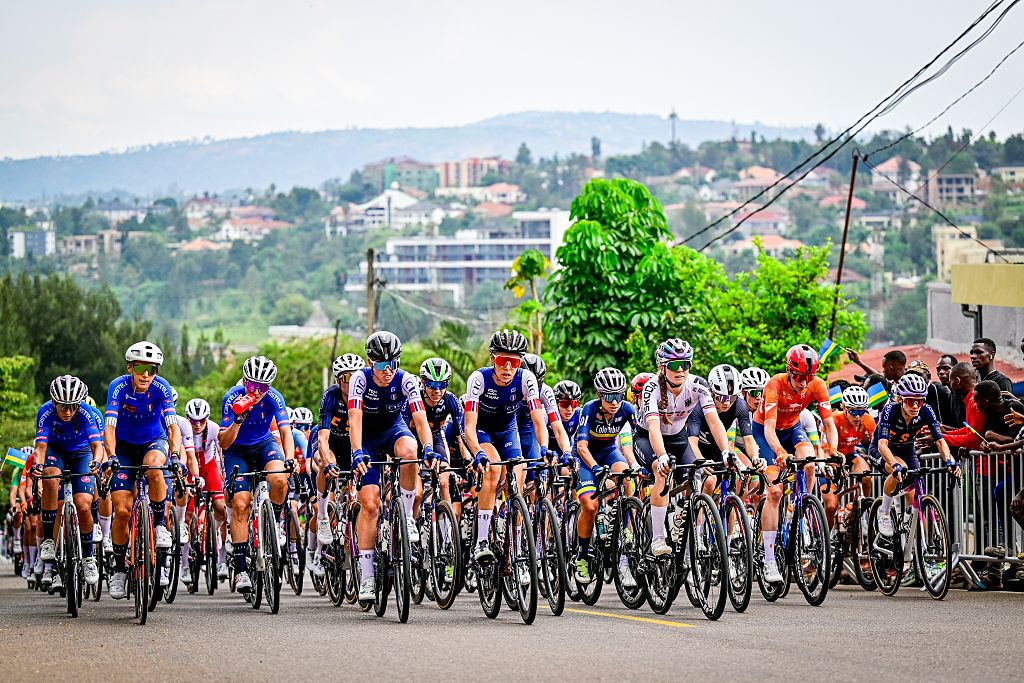 The pack of riders pictured in action during the elite women road race (164,6 km) at the cycling road World Championships in Kigali, Rwanda, Saturday 27 September 2025. The 2025 UCI Road World Championships take place from 21 to 28 September in Kigali, Rwanda. BELGA PHOTO DIRK WAEM (Photo by DIRK WAEM / BELGA MAG / Belga via AFP) (Photo by DIRK WAEM/BELGA MAG/AFP via Getty Images)