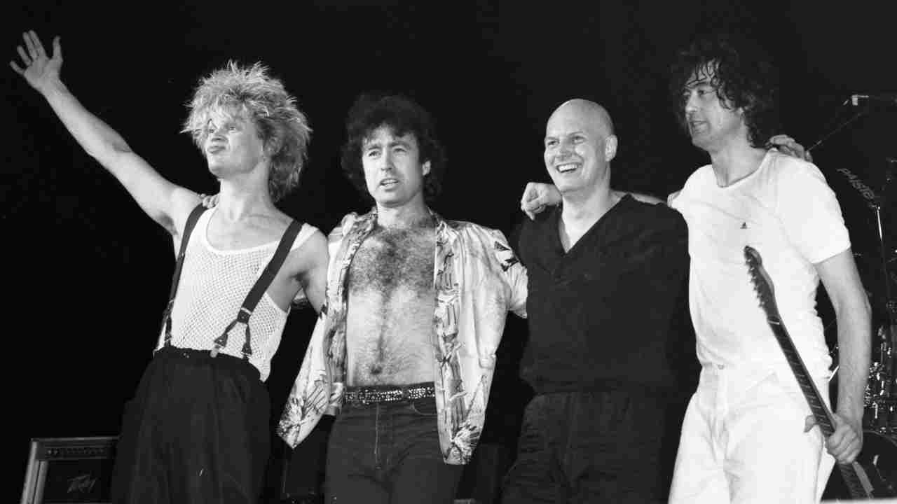 The Firm onstage in in 1984