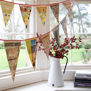 room with windows and bunting flags
