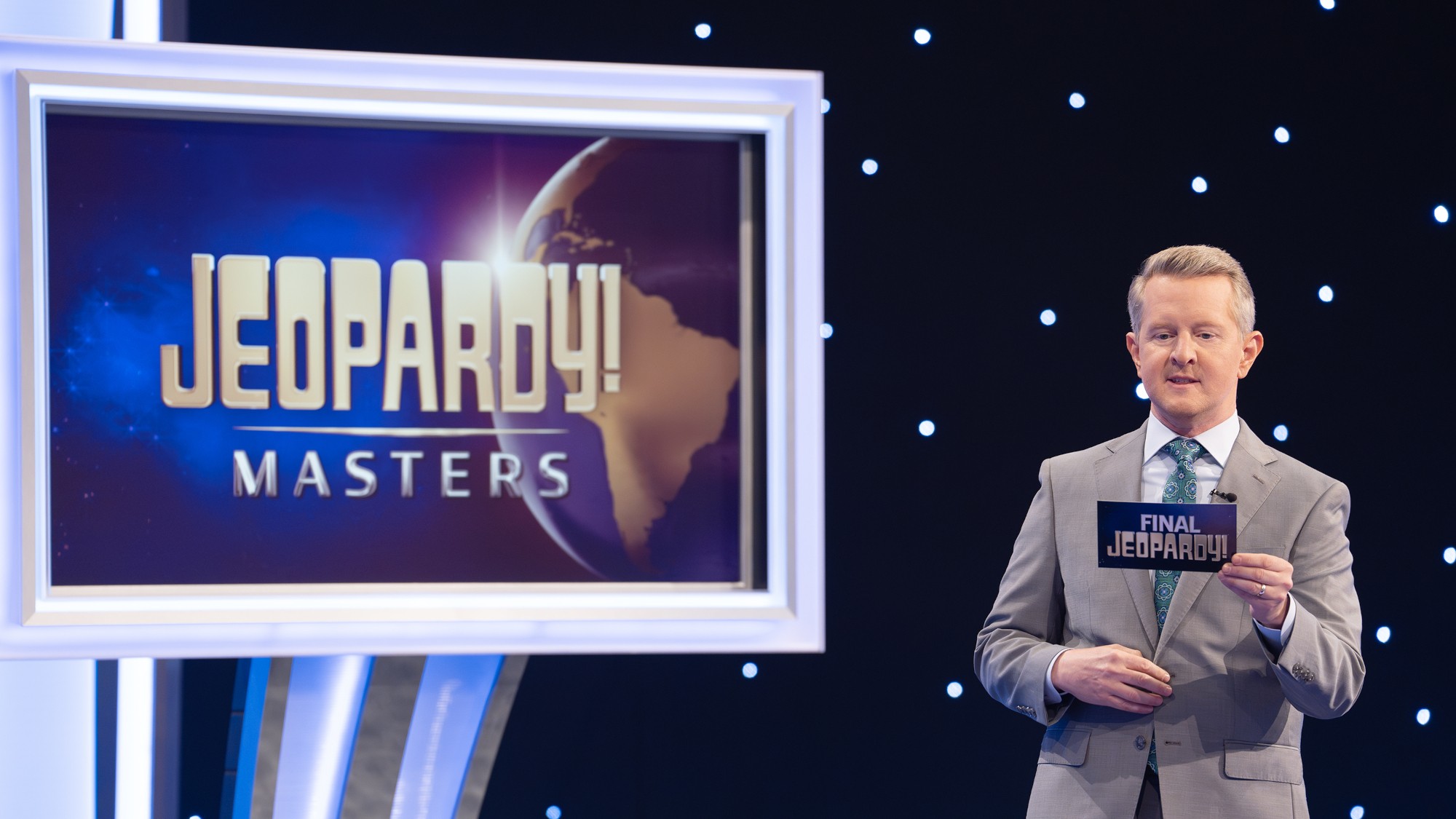 Ken Jennings reads a cue card on Jeopardy! Masters