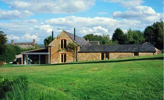 This Grade II-listed stone barn in south Warwickshire was designed by architect Ben Parsons