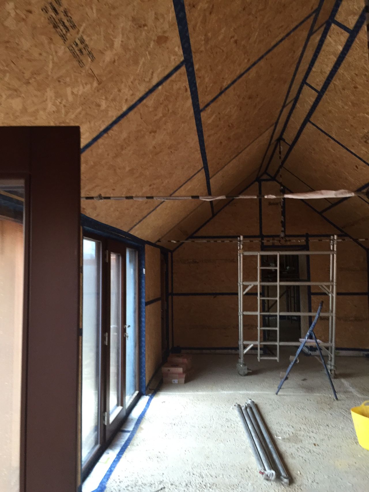 During: A timber frame 'house within a house' was built for optimal thermal efficiency.