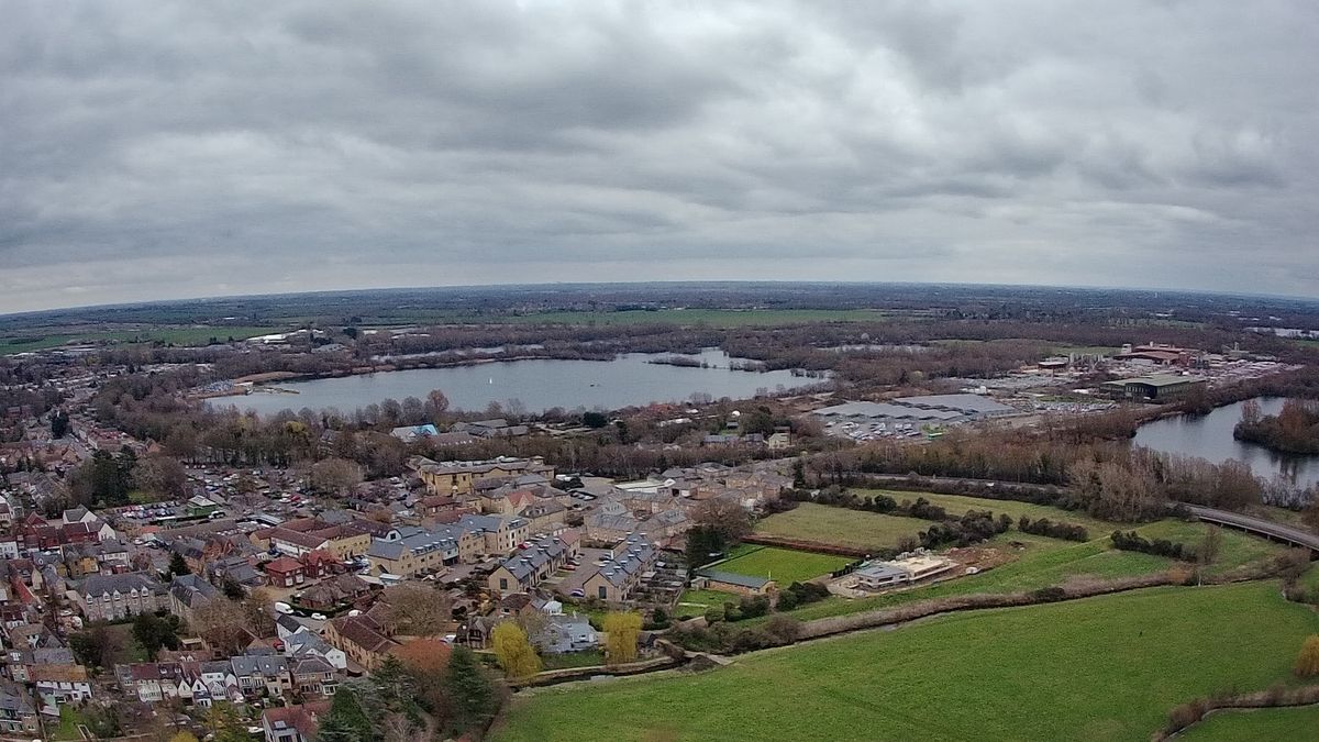 Ruko F11GIM2 Drone Example Image - aerial view of town and lake.