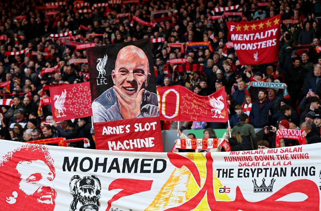 Liverpool fans show their support with flags and banners prior to the Premier League match between Liverpool FC and Ipswich Town FC at Anfield on January 25, 2025 in Liverpool, England