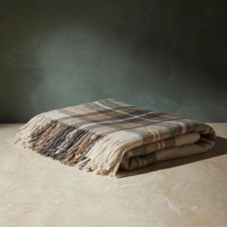 brown and beige tartan throw blanket