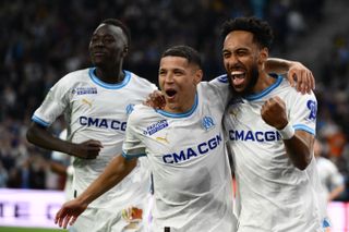Pierre-Emerick Aubameyang (right) celebrates after scoring for Marseille against Lens in April 2024.