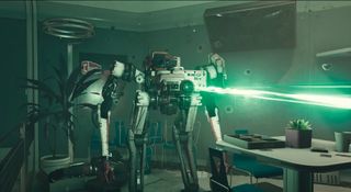 a bipedal robot fires a laser