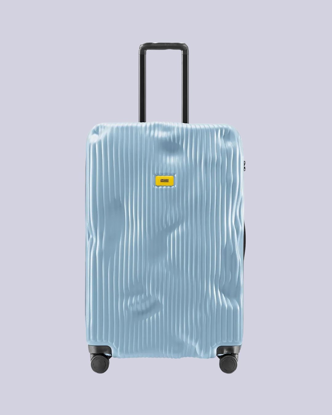 Crash Baggage Striped Luggage in pale blue against pale lilac background.