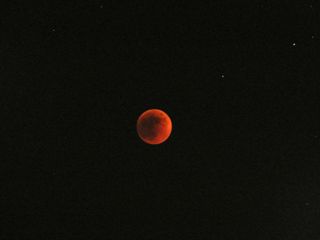 Skywatcher and photographer David Paleino snapped this later view of the total lunar eclipse of June 15, 2011 from Italy using a Fujifilm FinePix S2000HD camera.