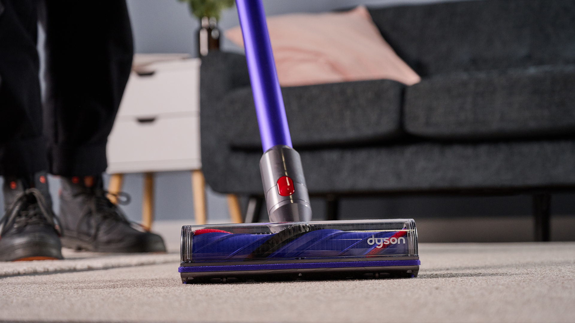 Dyson V11 vacuum being used on carpet