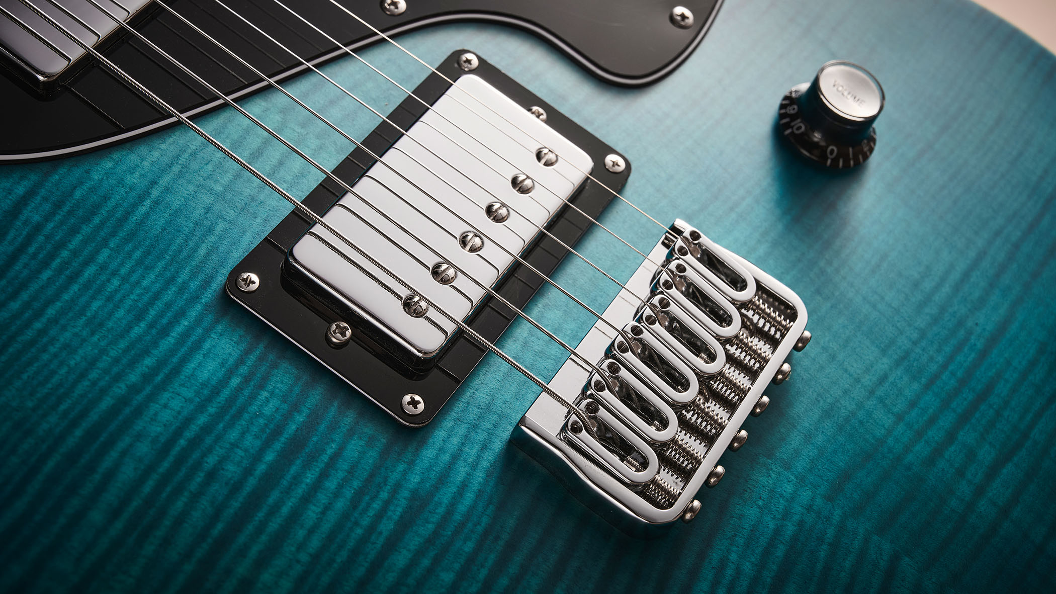 PJD Origin Series Carey Pro: the boutique singlecut is finished in Sea Blue with a black pickguard.