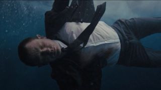 Daniel Craig wounded and floating underwater in Skyfall.