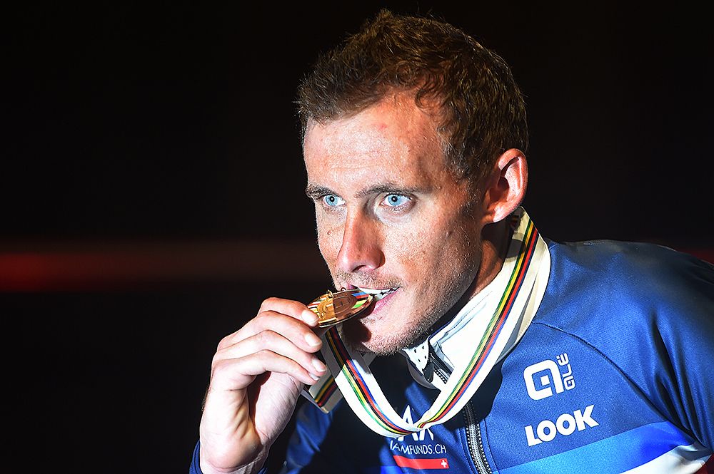 Jerome Coppel (France) bits the bronze medal